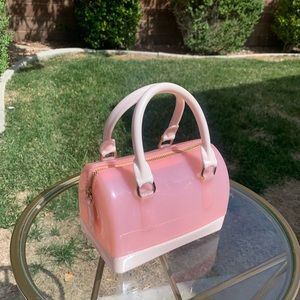 Small pink rubber purse
